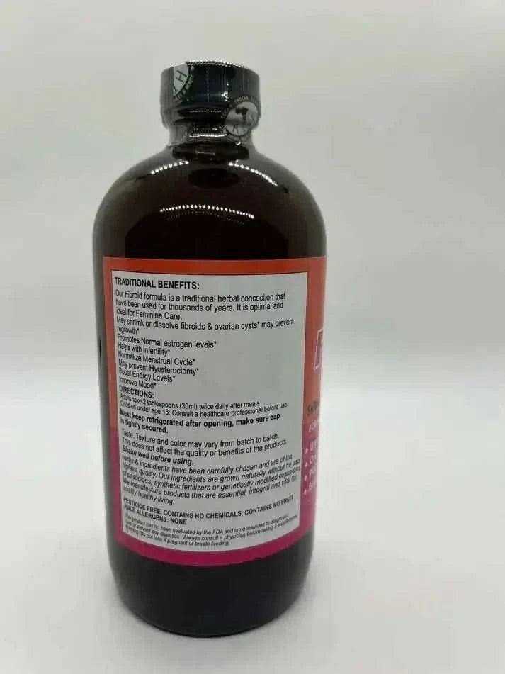 RoyalLuxsLLC herbal fibroid formula in a dark glass bottle with traditional benefits label