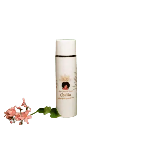 RoyalLuxsLLC Chella Haitian hair growth mist bottle with floral decoration on black background