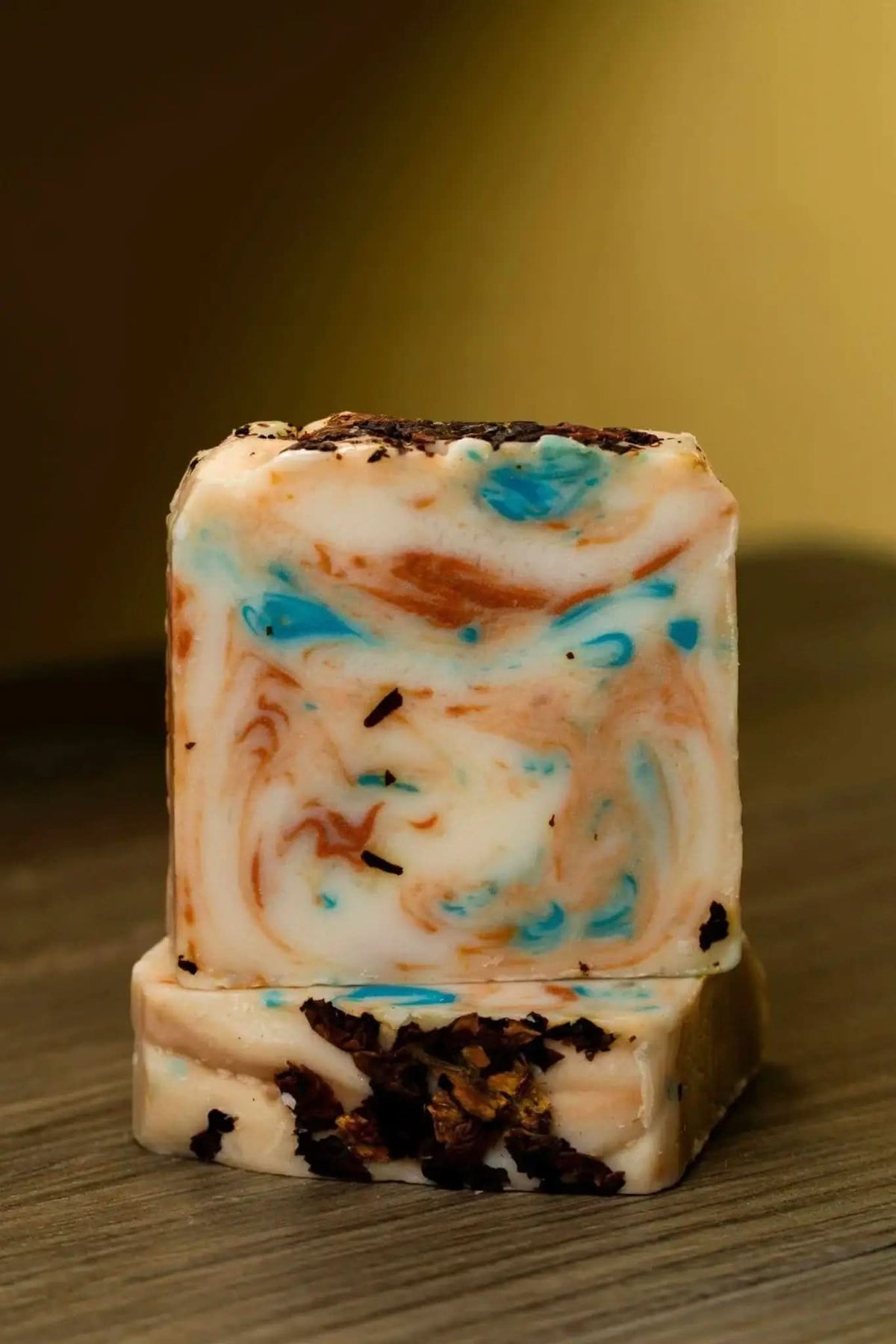 RoyalLuxsLLC milk rose petals bar soap with blue and orange swirls and dried rose petals