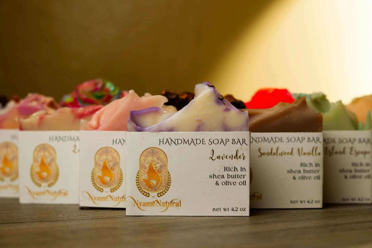 Pink berry mimosa handmade soap and other scented soap bars from RoyalLuxsLLC arranged in a row
