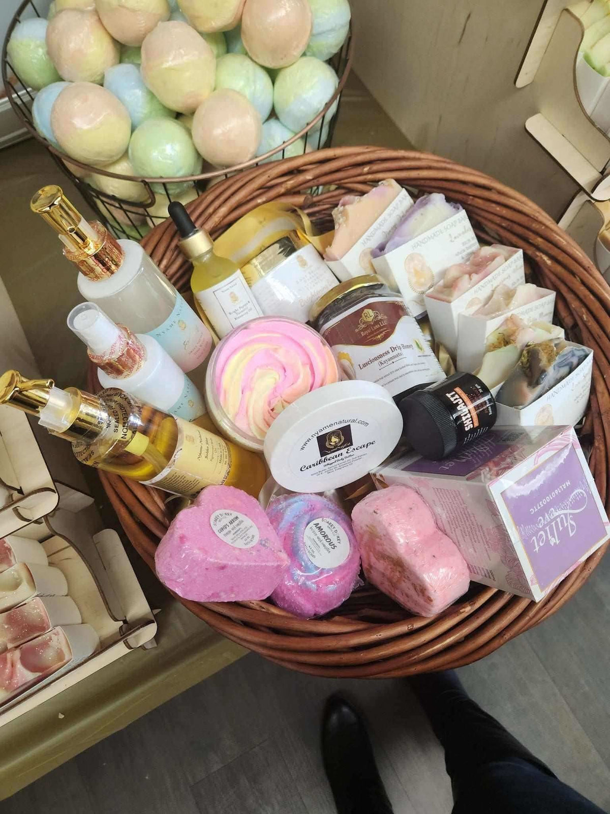 Queen relaxation gift basket by RoyalLuxsLLC with assorted bath bombs, oils, soaps, and body care products