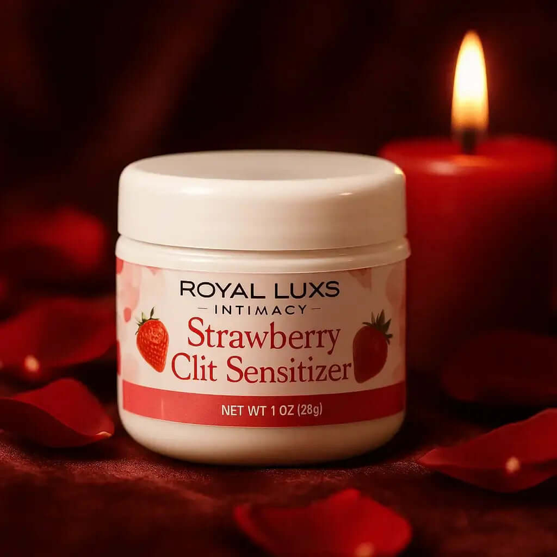 RoyalLuxsLLC Strawberry Clit Sensitizer Gel in white jar with red label and candle in background