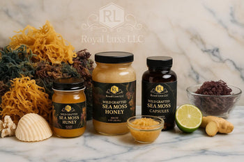 Wildcrafted sea moss gel and honey blends in jars with sea moss, lime, and ginger on marble surface
