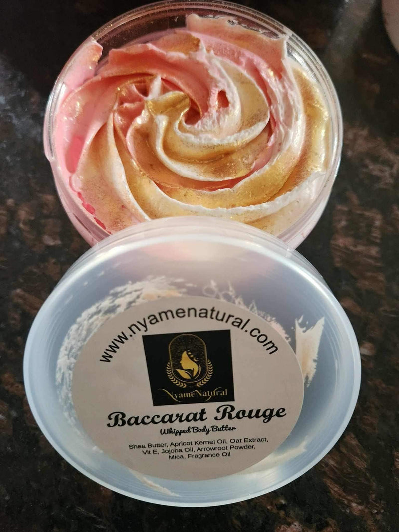 Baccarat Rouge Body Oil in a luxurious swirl, featuring pink and gold colors for deep nourishment and divine fragrance.