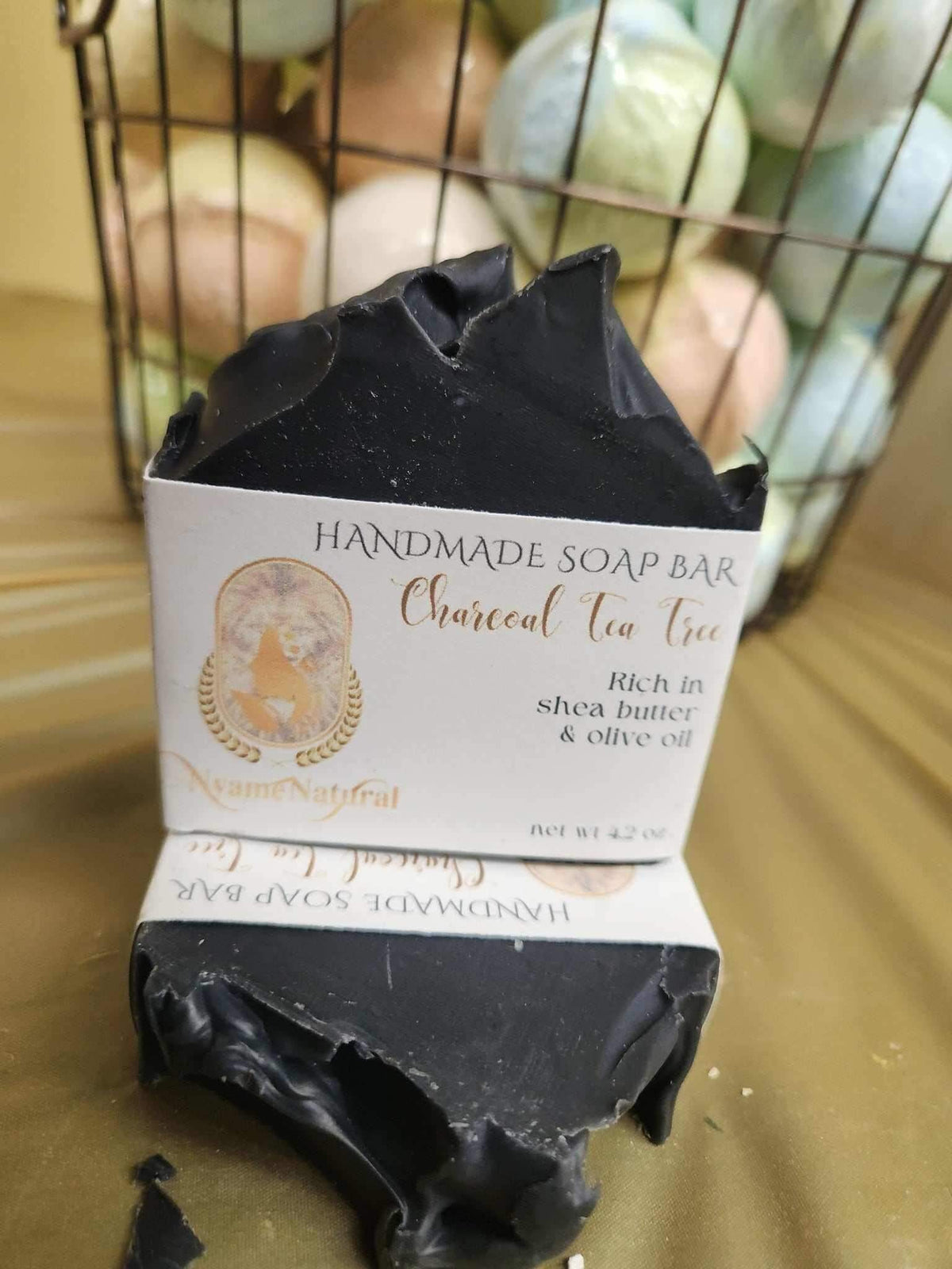 Charcoal Tea tree soap bar featuring rich shea butter and olive oil for deep moisture and detox benefits.