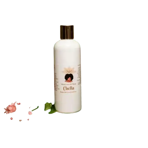 RoyalLuxsLLC white bottle of Haitian hair growth conditioner with brown cap and floral design on black background