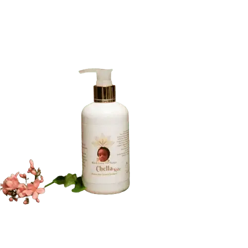 RoyalLuxsLLC Haitian hair growth shampoo for kids in white pump bottle with floral decoration