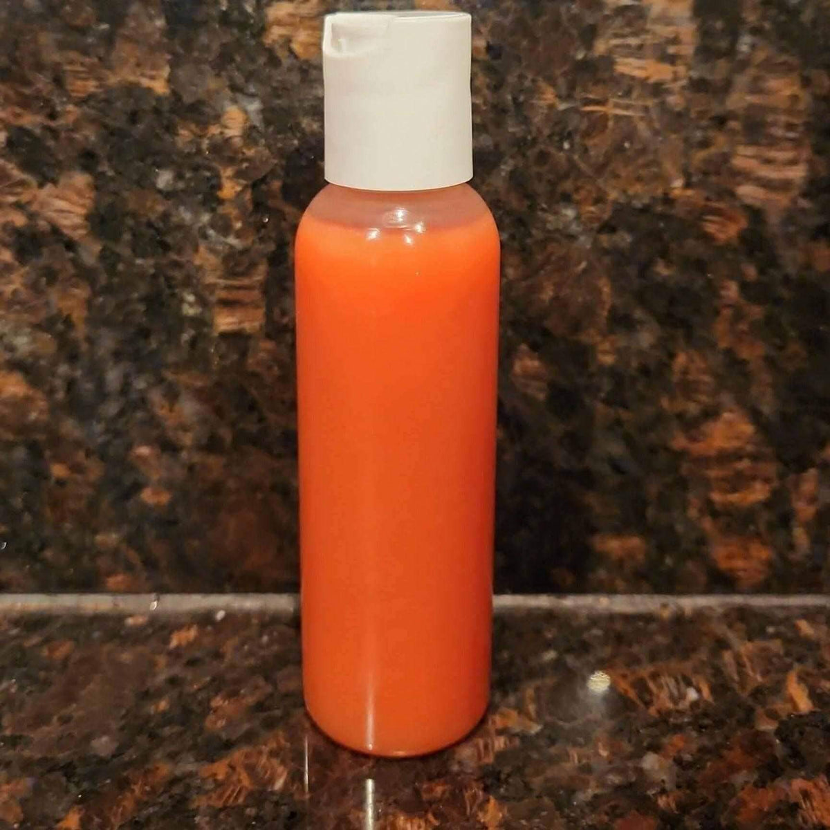 Dark Inner Thighs & Armpits Solution Serum in a clear bottle on a dark background