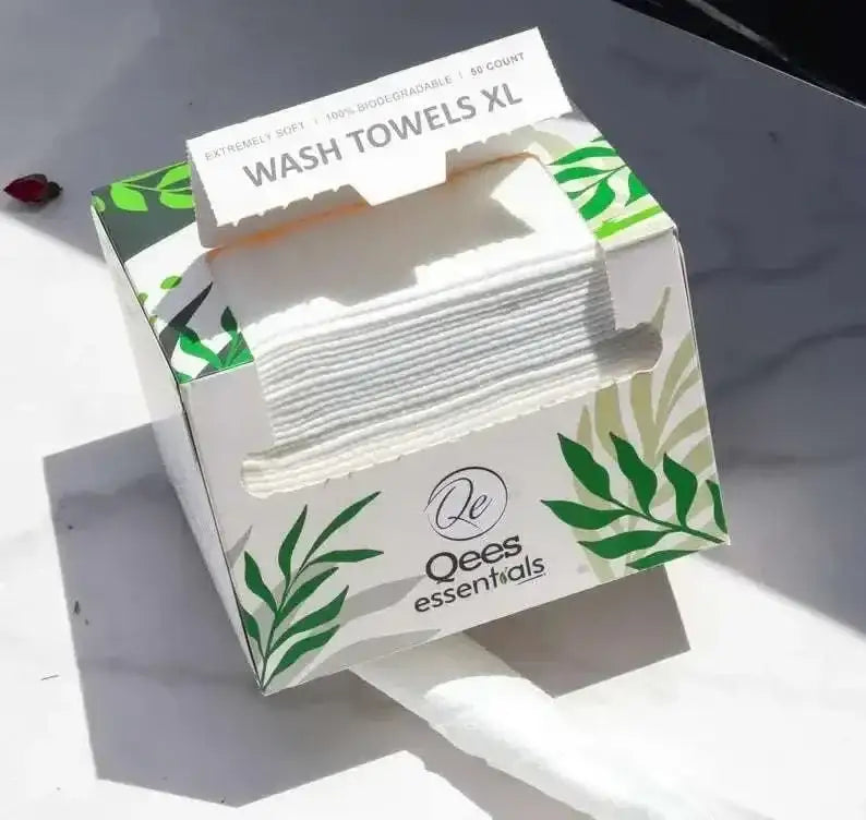 Disposable Biodegradable Face Towels Makeup Remover in eco-friendly packaging with herbal designs.