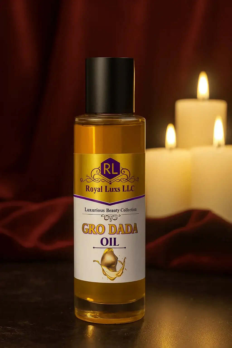 Gro Dada Botanical Body Nourishment Oil – 4 oz. bottle next to candles, luxurious beauty collection for skin nourishment, cleanse.