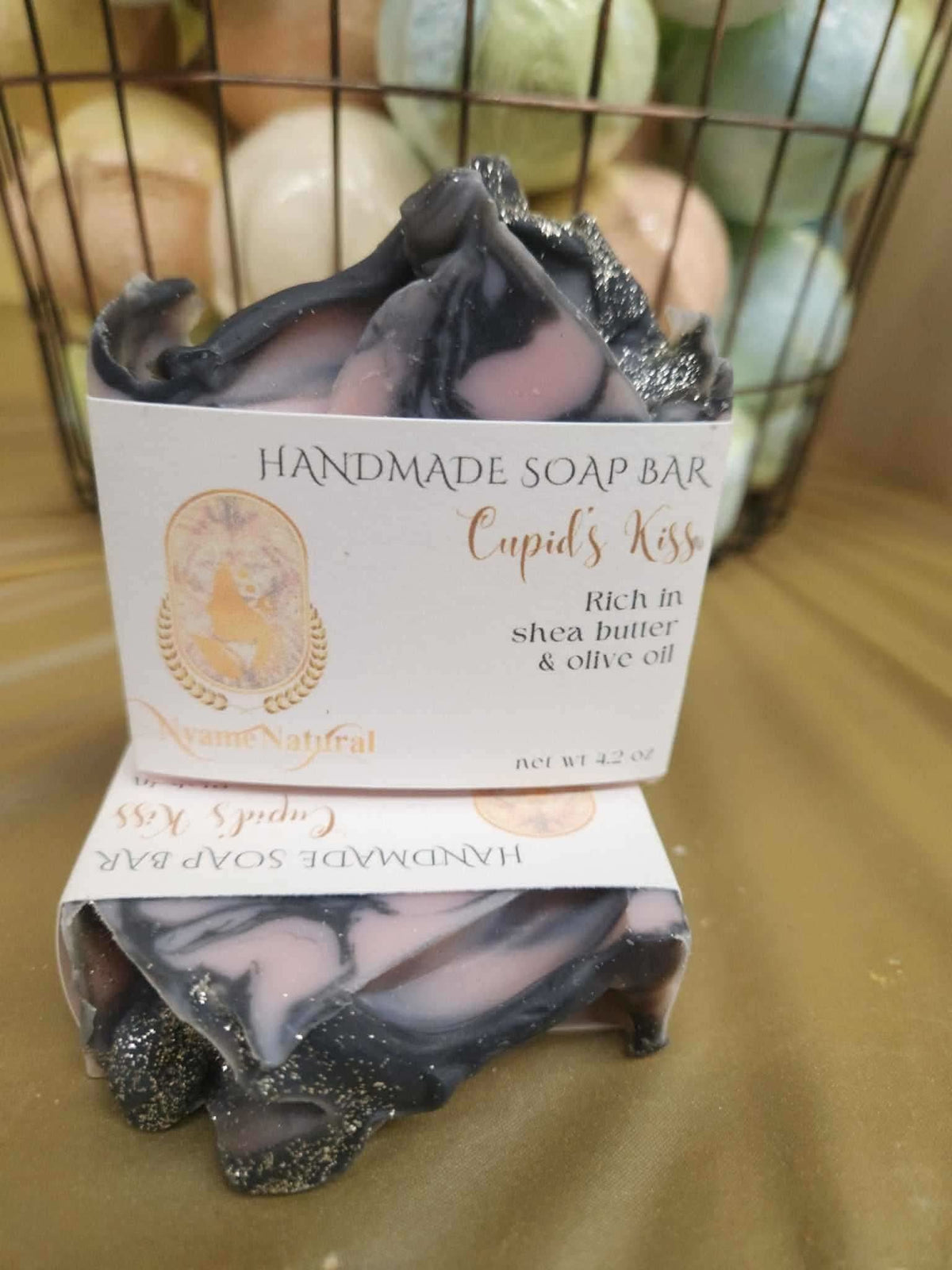 Cupid Kiss handmade soap bar by RoyalLuxsLLC with black and pink marbled design rich in shea butter and olive oil