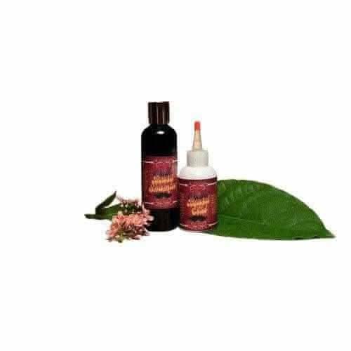 RoyalLuxsLLC herbal king set wellness kit with two bottles and natural leaves and flowers
