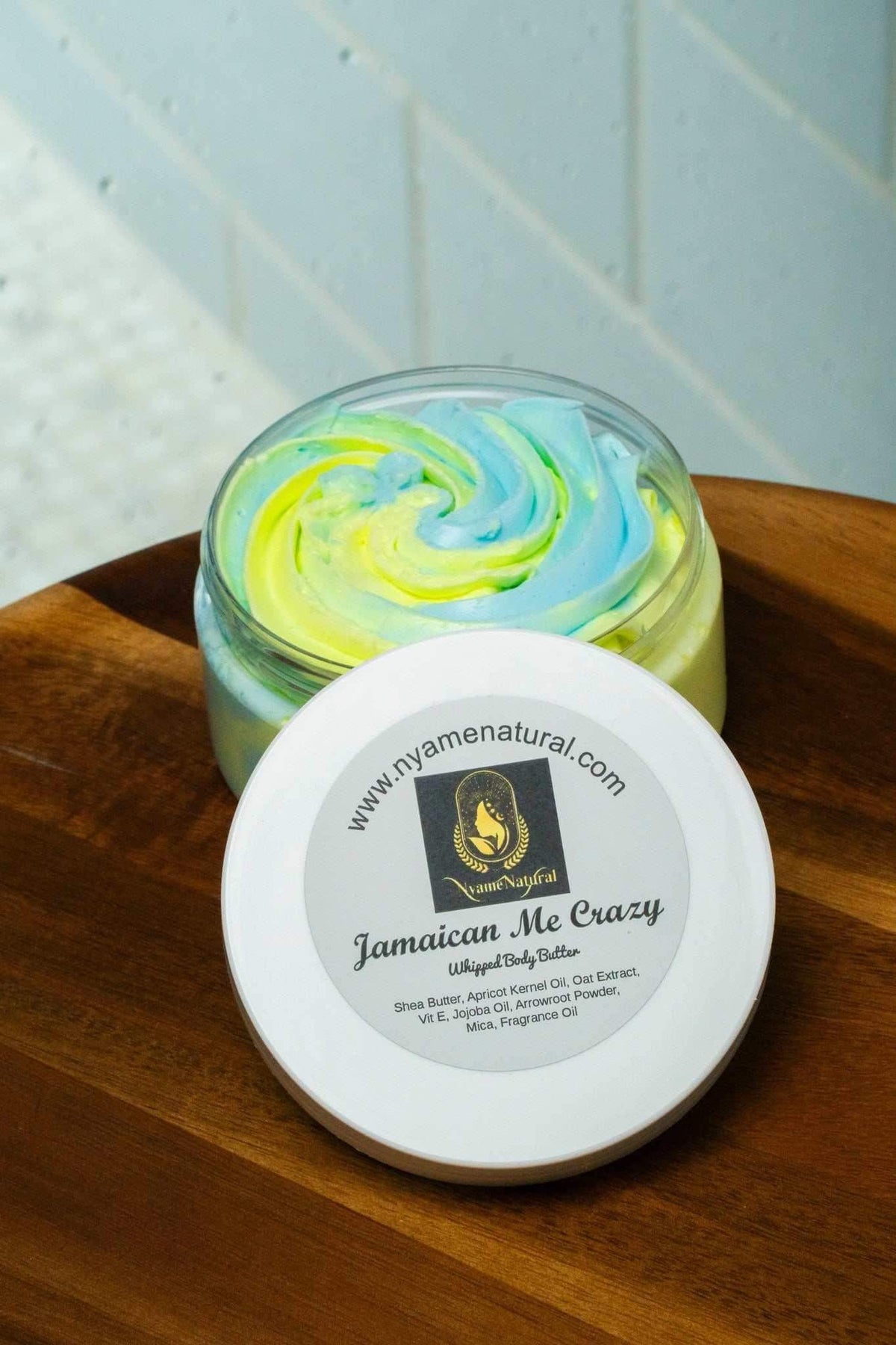 Jamaican me crazy Body Butter in a jar with colorful swirls on top for deep nourishment and non-sticky finish