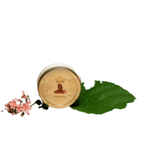 RoyalLuxsLLC kojic acid brightening body scrub in jar with green leaf and pink flowers