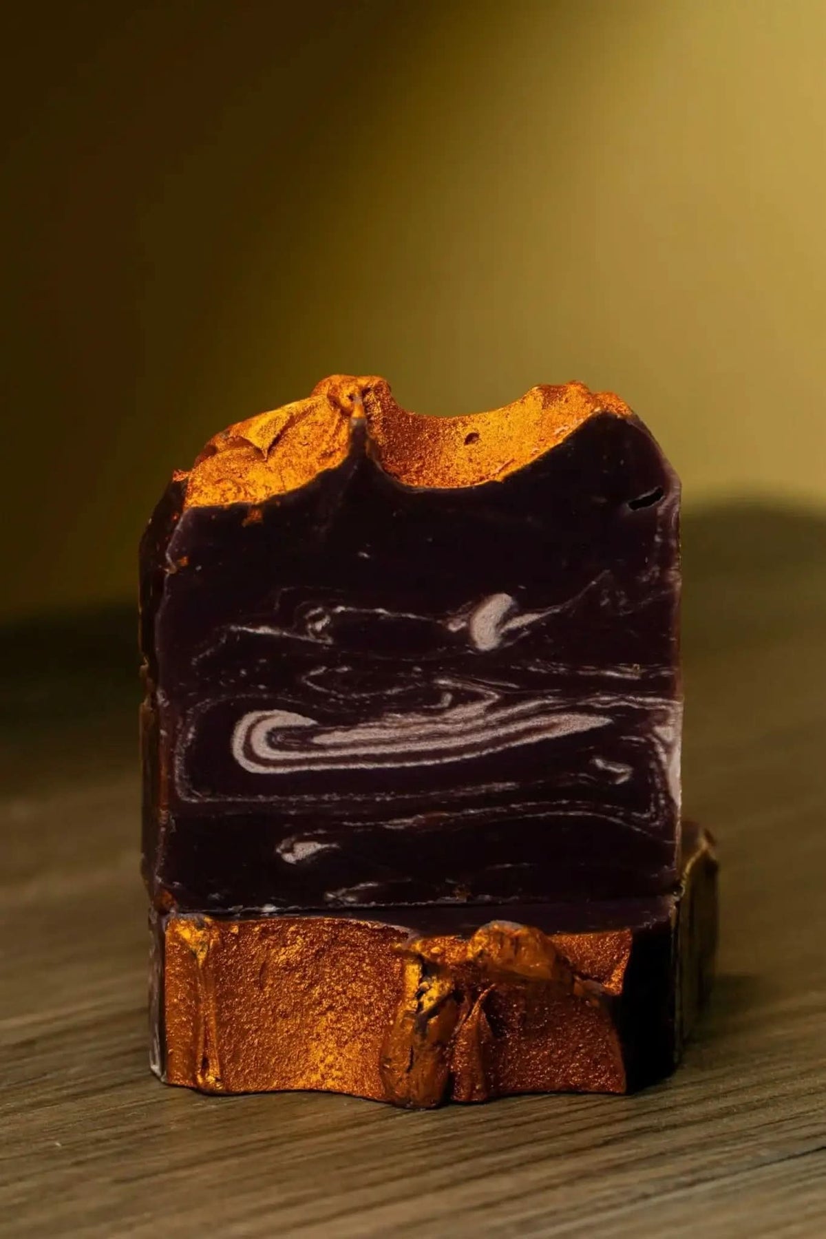 RoyalLuxsLLC lavender gold herbal soap bar with rich dark swirls and shimmering gold accents