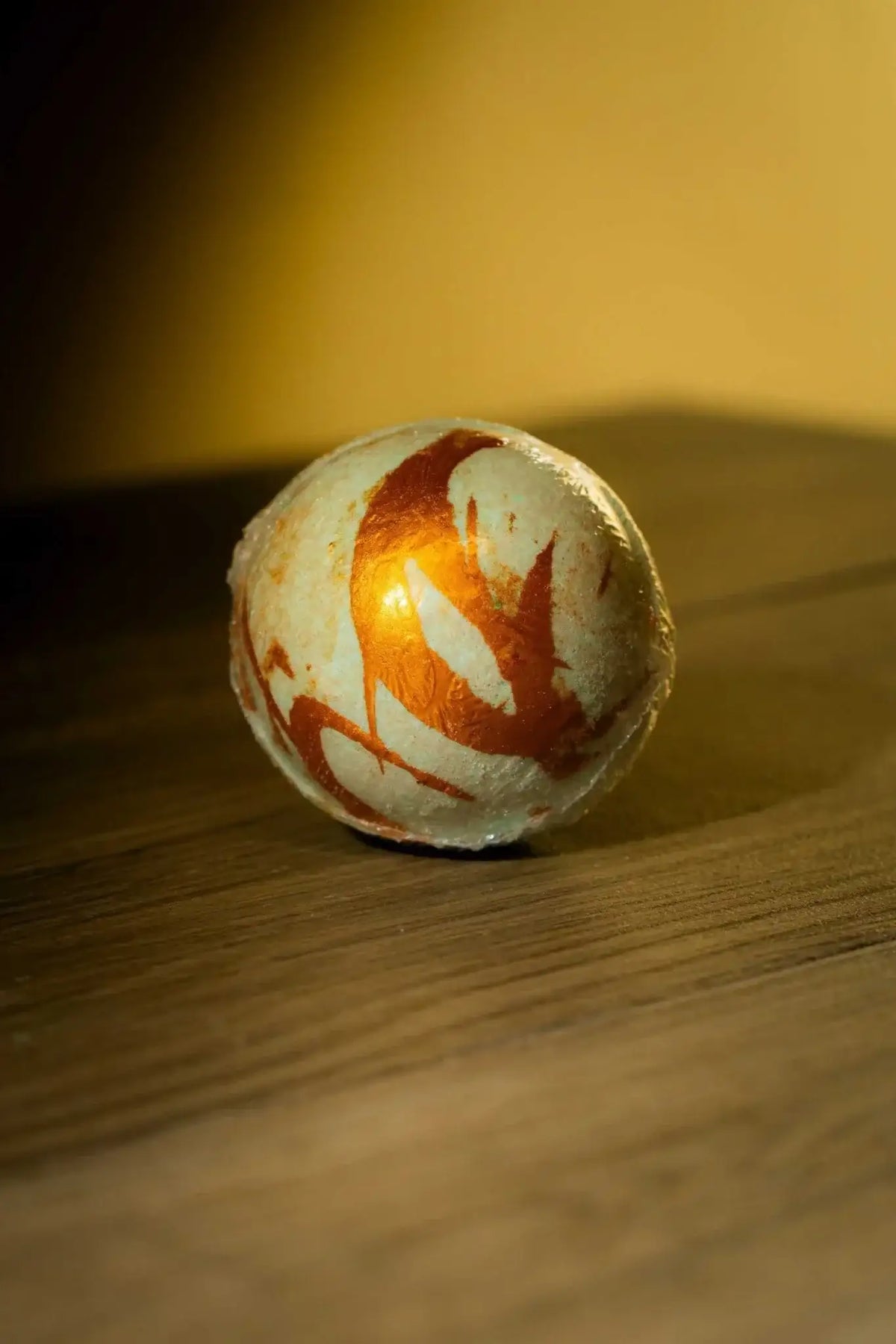 Luxurious Body Bath Bomb showcasing vibrant colors and unique design for a soothing cleanse and detox experience.