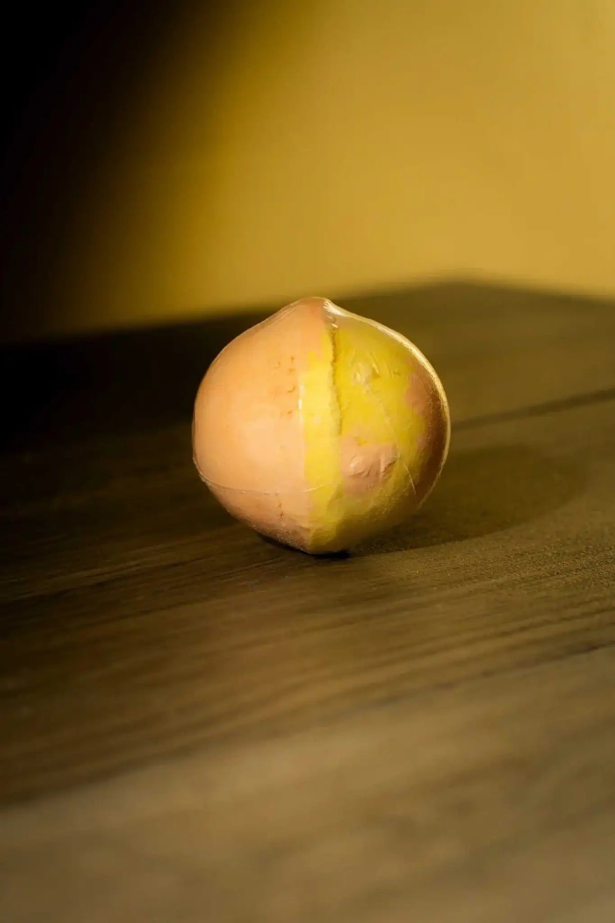 Luxurious Body Bath Bomb in vibrant colors showcasing a handcrafted design, perfect for a soothing detox bath experience.