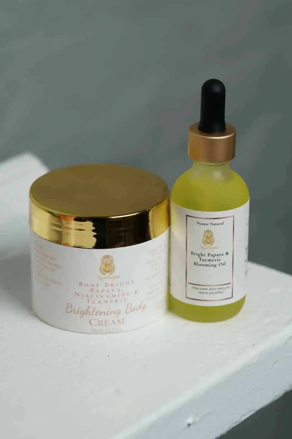 RoyalLuxsLLC natural face brightening cream and oil set with gold lid and dropper bottle