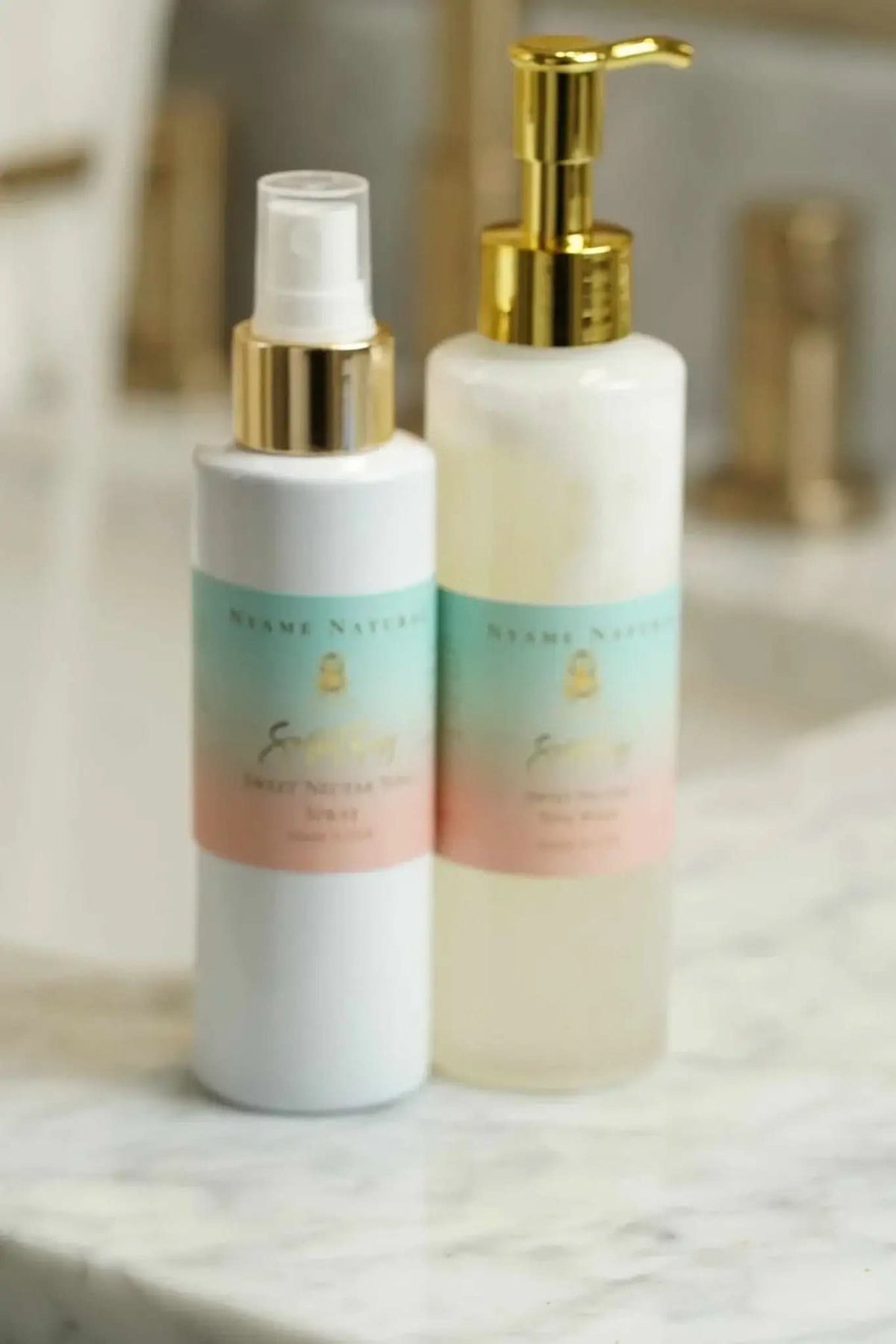 RoyalLuxsLLC herbal yoni kit with two body care bottles including a spray and a pump dispenser