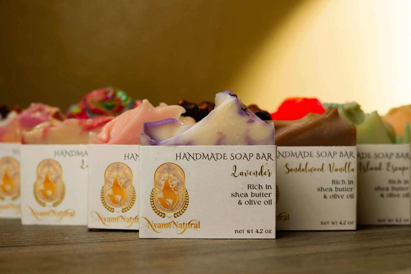 Pink Berry Mimosa handmade soap bars featuring rich plant-based oils and colorful designs.