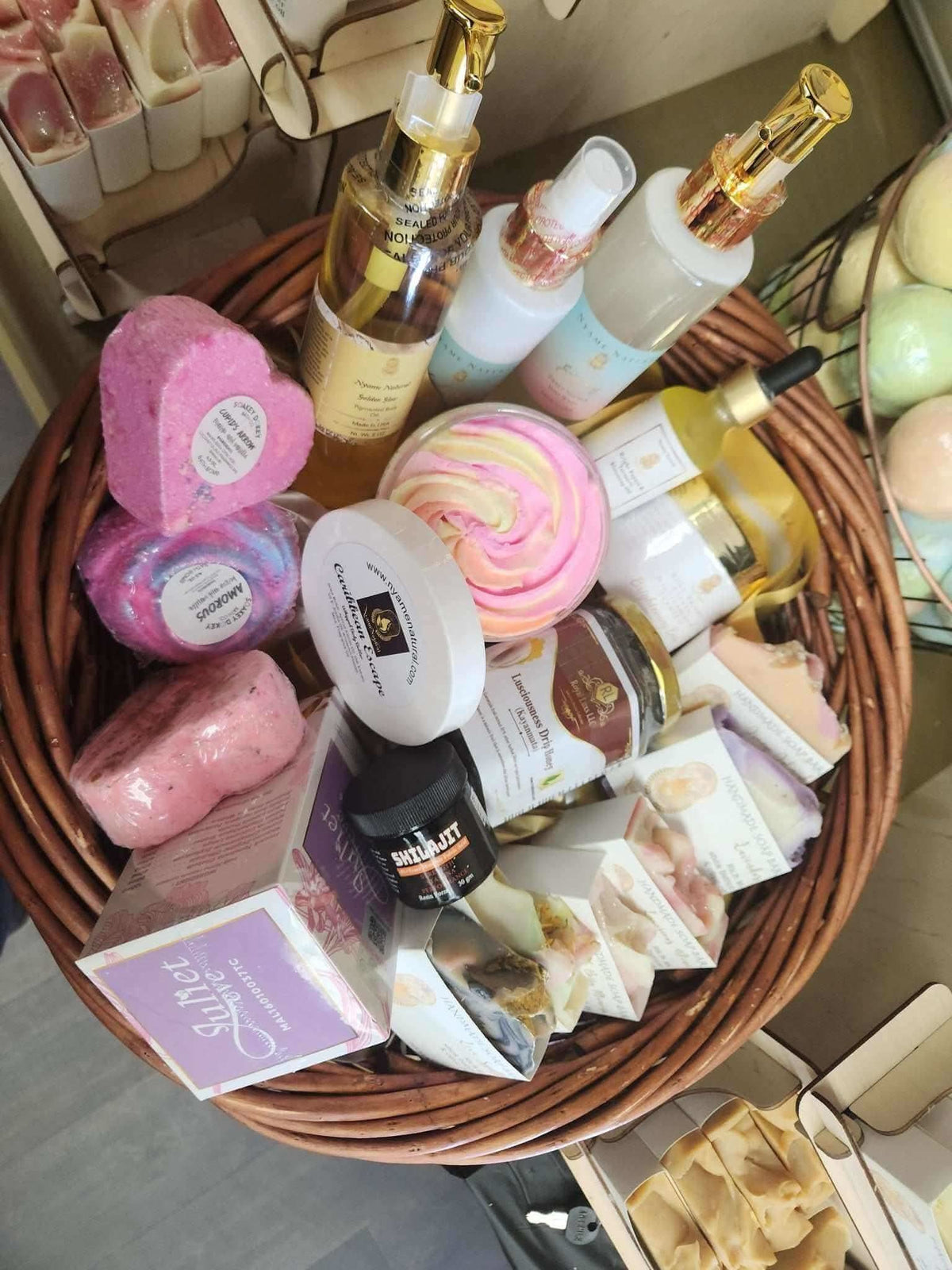 RoyalLuxsLLC queen relaxation gift basket with assorted body care products and bath items in a wicker basket