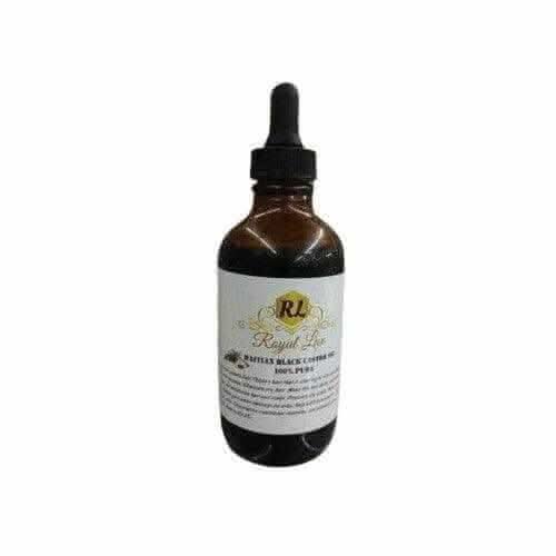 RoyalLuxsLLC 100% pure Haitian black castor oil in a brown glass dropper bottle