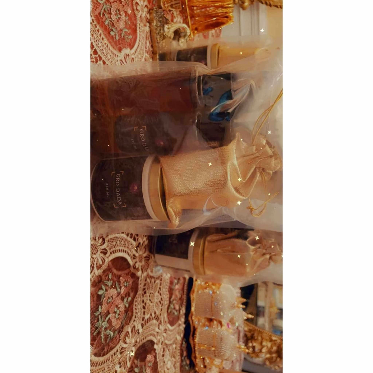 RoyalLuxsLLC Gro Dada Kit for hip and butt enhancement with bottles and fabric pouches on decorative table