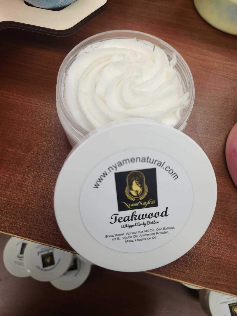 Teakwood Body butter in a jar on a wooden surface, promoting skin nourishment and hydration.