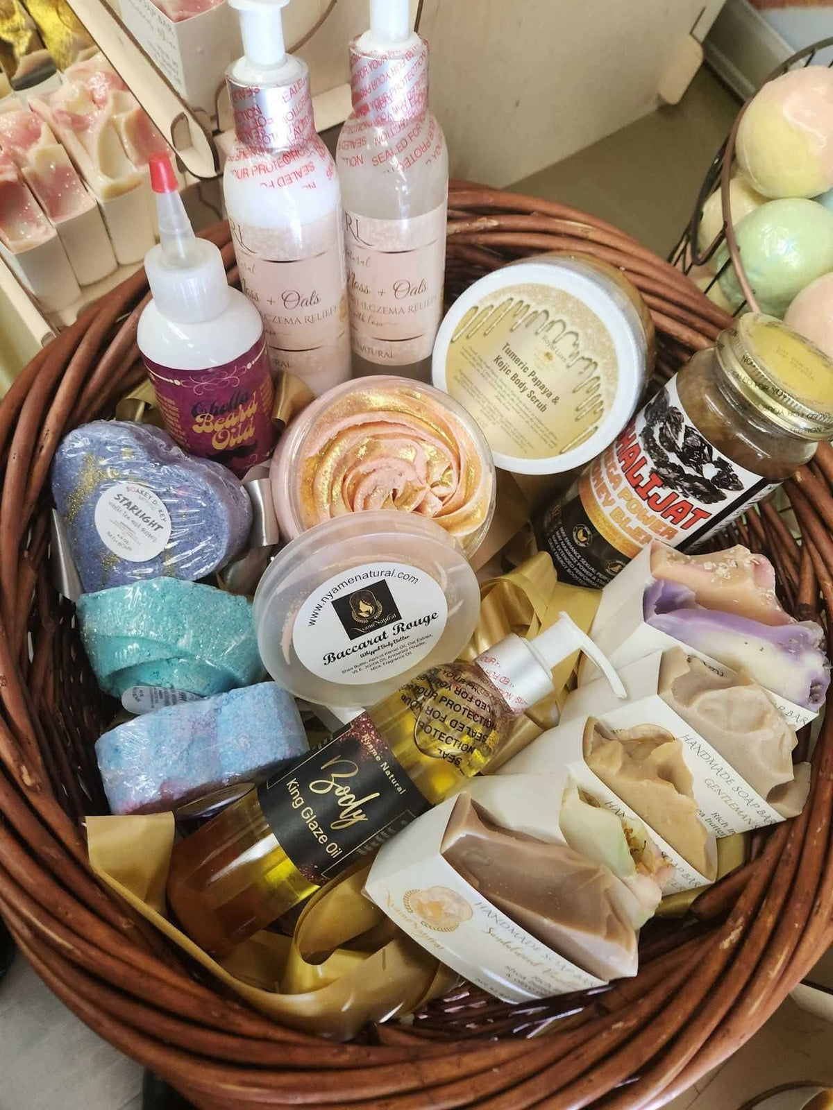 RoyalLuxsLLC relaxation gift basket for men with assorted bath bombs, lotions, oils, and soaps in a woven basket